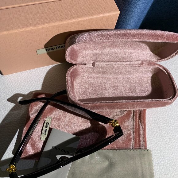Miu Miu Black Oval Sunglasses • Gold Logo Statement main image 4